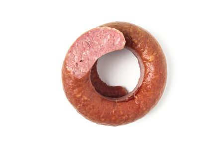 Smoked sausage isolated on whiteの写真素材
