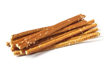 Bread sticks straws with salt on a white backgroundの写真素材