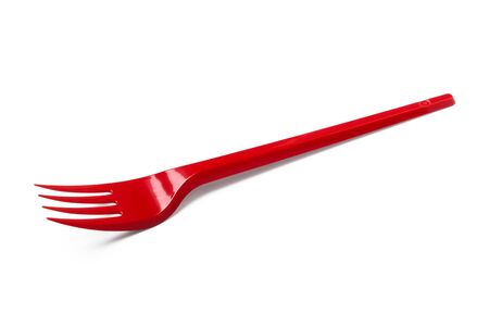 Red plastic disposable fork isolated on white background