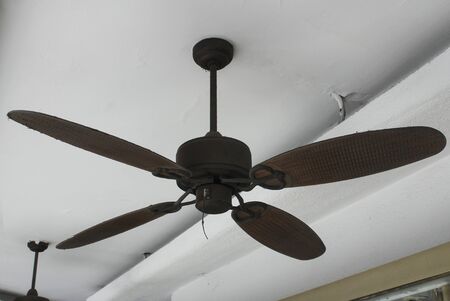 Old electric ceiling fan. Ceiling fan indoorsの写真素材