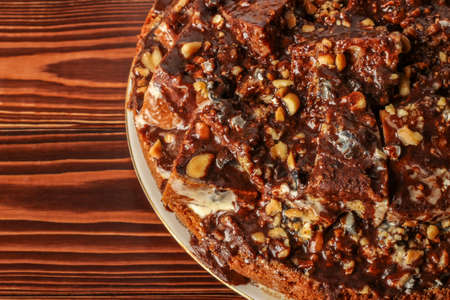 Handmade sponge cake with nuts and cocoa close-up