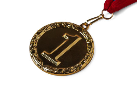 Gold medal for first place in competition isolated on white backgroundの写真素材