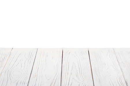 Edge of white wooden table top isolated on white backgroundの写真素材