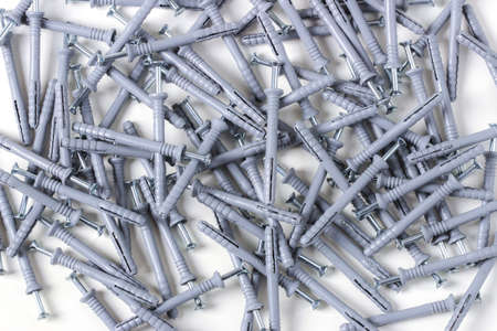 Dowel-nails in bulk on a white backgroundの写真素材