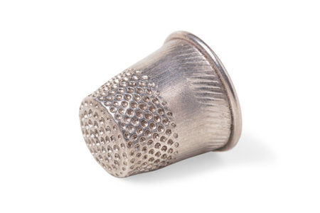 Metal sewing timble isolated on white backgroundの写真素材