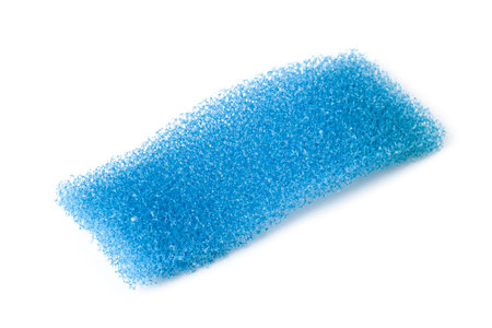 Vacuum cleaner filter in the form of a sponge isolated on a white backgroundの写真素材