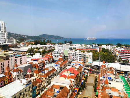 Aerial view of Patong beach, Phuket island and sea, urban city with blue sky. Andaman sea, Thailand.のeditorial素材