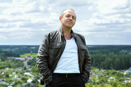 Man pose on the mountainの写真素材