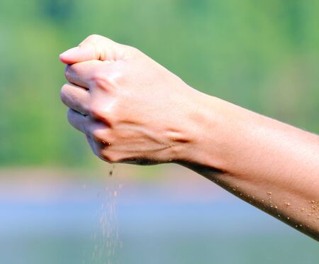 Hand with sandの写真素材