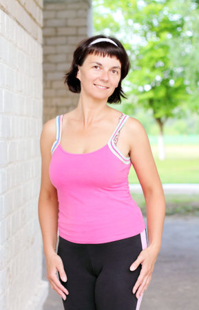Portrait of sporty girl on natureの写真素材