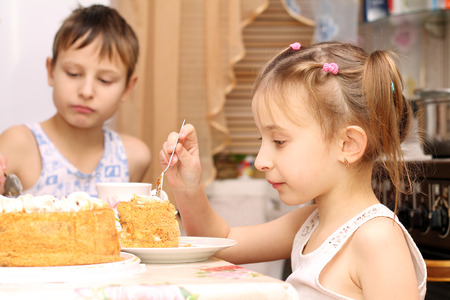 child eats at the tableの写真素材