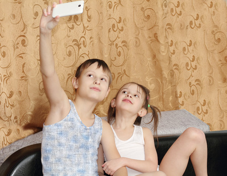 children themselves photographedの写真素材