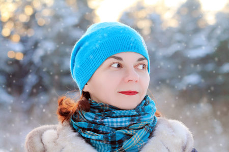 woman in a park in winterの写真素材