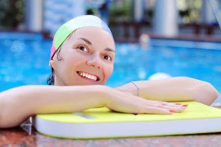 woman in the poolの写真素材