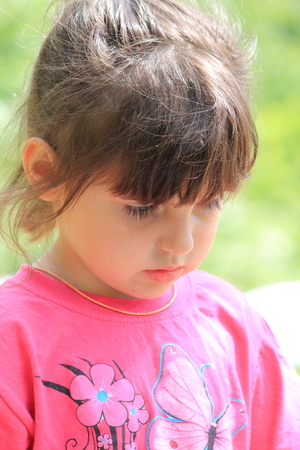 girl plays in nature in the afternoonの写真素材