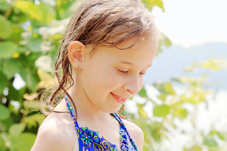 girl plays in nature in the afternoonの写真素材