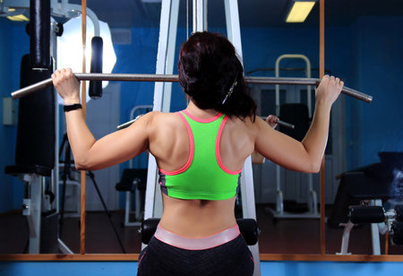 athletic woman in training in the club