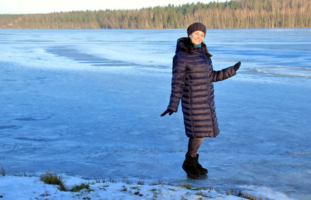 Portrait of a woman in winter in natureの写真素材