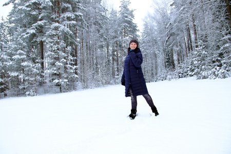 Portrait of a woman in winter in natureの写真素材