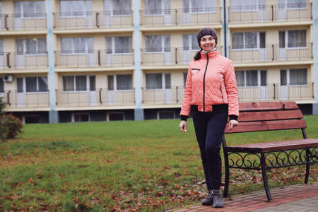 Woman portrait in nature in autumnの写真素材