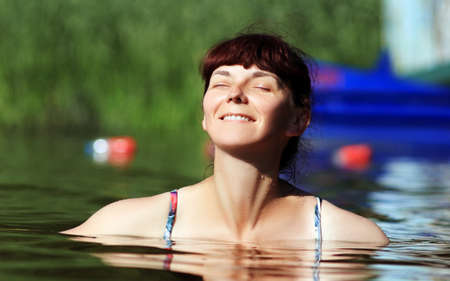 a woman in the waterの写真素材