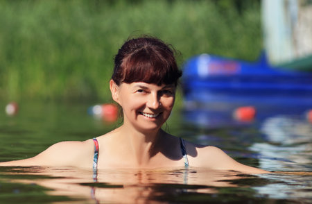 a woman in the waterの写真素材