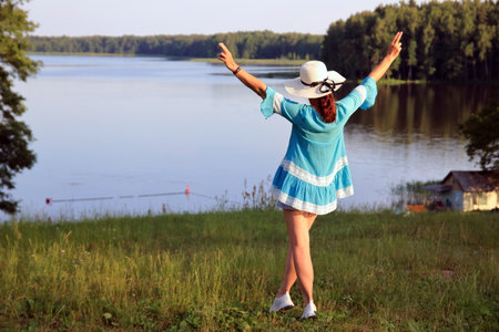 Portrait of a woman on the lake shoreの写真素材