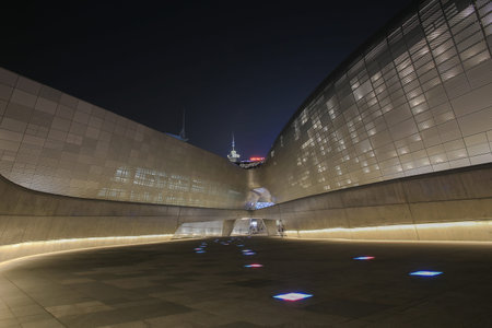 SEOUL, SOUTH KOREA - AUGUST 13, 2014: Dongdaemun Design Plaza at Night, New development in Seoul, designed by Zaha Hadid. Photo taken August 13, 2014 in Seoul, South Koreaのeditorial素材
