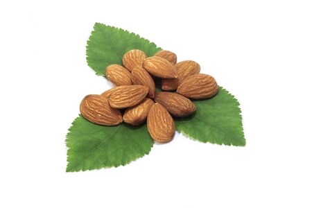 Closeup almonds on white backgroundの写真素材