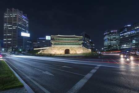 Traffic at old fortress Namdaemun gate in Seoul South Korea.のeditorial素材