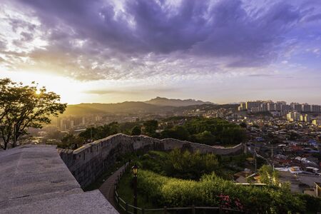 Seoul City Skyline Sunset Location at Naksan Park with Ancient Walls in Seoul South Koreaのeditorial素材