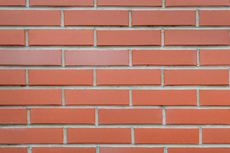 Background. Red brick wall close-up.