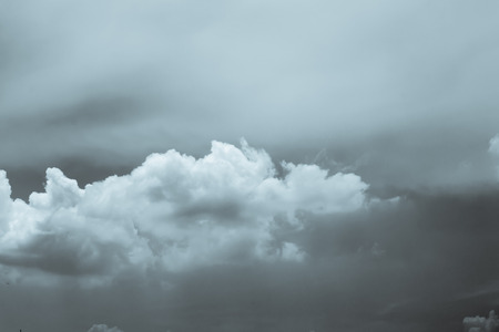 Dark ominous grey storm clouds  Dramatic sky の写真素材
