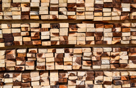 stack of lumber in timber logs storage for construction or industrial work  texture background