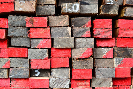 stack of lumber in timber logs storage for construction or industrial work  texture backgroundの写真素材