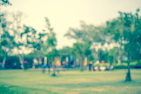 Colorful playground with children and parents in park (blur background)の写真素材