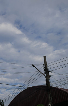 Clear sky and lampposts in the eveningの写真素材