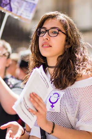 8m Feminist women day march fighting for woman rights in Guadalajara Spain. Demonstration and gender education activismのeditorial素材