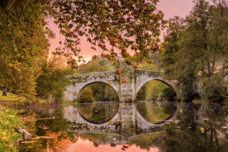 Allariz in Orense, Galicia is a way of st. James beautiful roman spanish traditional village with a roman old bridge on the Arnoia river relax landscapeの写真素材