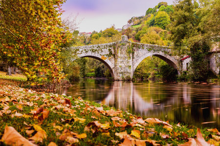 Allariz in Orense, Galicia is a way of st. James beautiful roman spanish traditional village with a roman old bridge on the Arnoia river relax landscapeの写真素材