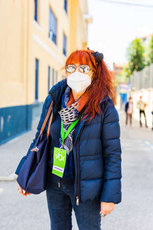 MADRID, MADRID - SPAIN - MAY 05, 2021 - Autonomous community of Madrid elections. Democraty referendum for government vote. Right vs left political party. Vox representativeのeditorial素材