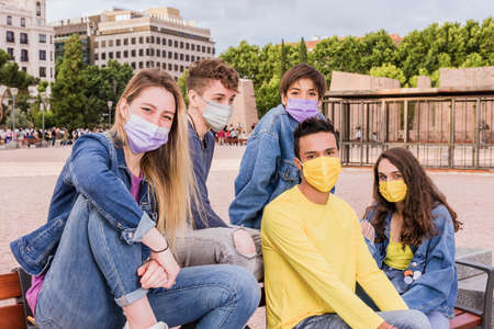 new normal virus life with a young students multiracial group wearing face mask for pandemicの写真素材