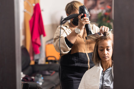 haircut hairstyle Hispanic professional beauty salon female with coronavirus facemask mixed race