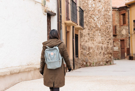Buitrago de Lozoya local tourism in Madrid. Young Latin honduran woman travel on holiday trip