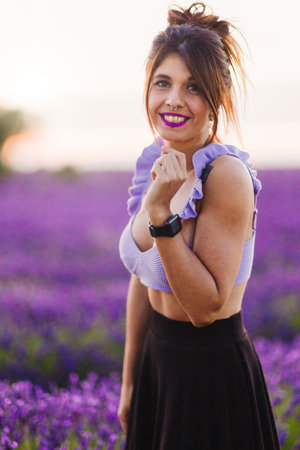 beauty cosmetic women health aromatherapy and perfume in countryside lavender. mid hispanic womanの写真素材