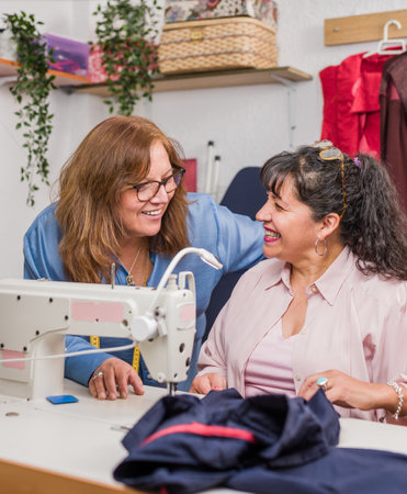 Teaching leisure professional activity. Sewing for sustainable fashion. Mature latin chilean womenの写真素材