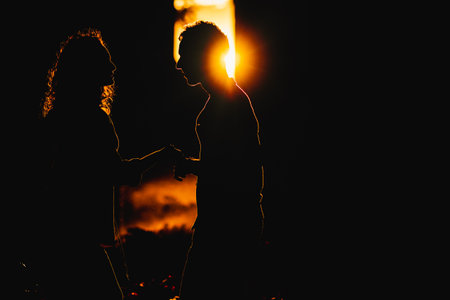Couple dancing salsa at sunset in madridの写真素材