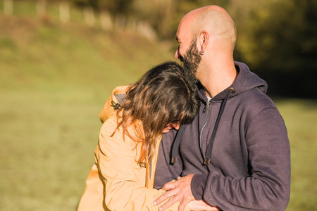 Veterinarians embracing in a meadow in asturias, spain