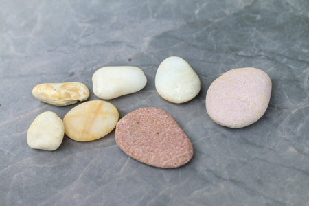 Various stones are placed on the marble surface.