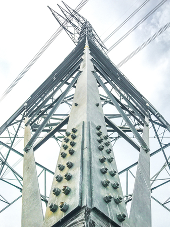 High power pylons and natural green with clear skies.の写真素材